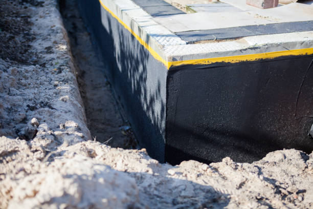 Professional Waterproofing technician working in Anna, OH
